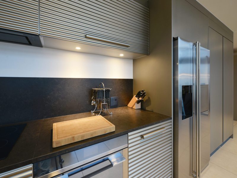 Luxury modern kitchen area and decoration at night on condominium, interior design Luxury modern kitchen area and decoration at night on condominium, interior design